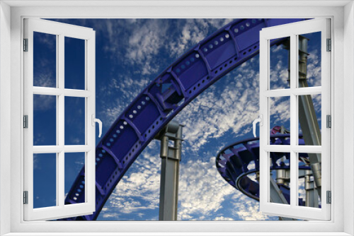 Fototapeta Naklejka Na Ścianę Okno 3D - Attraction roller-coaster (switchback) on the background of the cloudy sky
