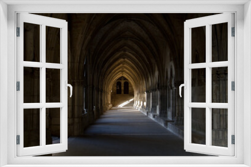 Fototapeta Naklejka Na Ścianę Okno 3D - Dark gallery of a monastery