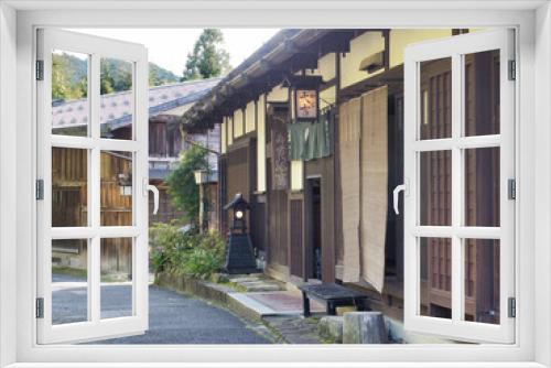 Fototapeta Naklejka Na Ścianę Okno 3D - Tsumago,post town in Japan.Tsumagojuku of Nakasendo(ancient post road) in Minamikisocho,Nagano prefecture.Famous travel landmark of preserved old Japanese town.