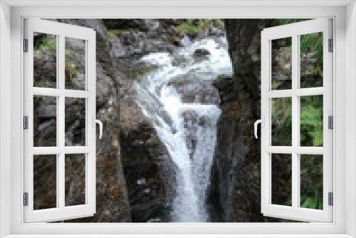 Fototapeta Naklejka Na Ścianę Okno 3D - The Riesach Waterfalls dropping in the Holl Gorge, a series of powerful waterfalls near the Town of Schladming, the largest waterfalls in Styria, Austria