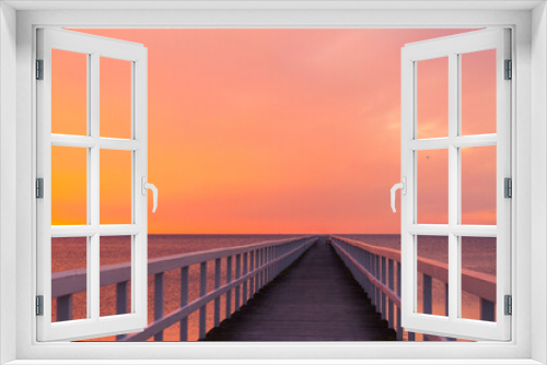 Fototapeta Naklejka Na Ścianę Okno 3D - Beautiful sunset over the sea with wooden pier