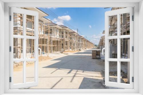 Fototapeta Naklejka Na Ścianę Okno 3D - construction residential new house in progress at building site housing estate development