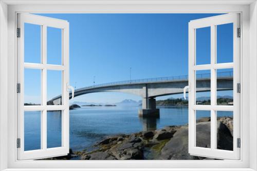 Fototapeta Naklejka Na Ścianę Okno 3D - Fjord bridge on the blue sea and blue sky background
