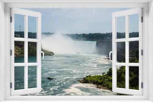 Fototapeta Naklejka Na Ścianę Okno 3D - Niagara Horseshoe falls on sunset - blue water, haze and cloudy sky. Dramatic tones