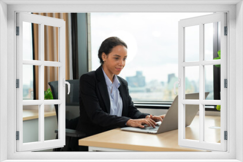 Successful businesswoman working and looking camera at her office desk, Concept of business risk analysis and assessment