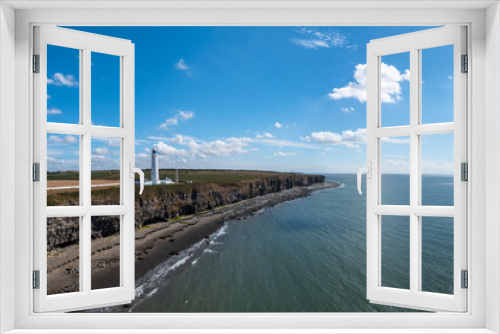Fototapeta Naklejka Na Ścianę Okno 3D - aerial view of the Nash Point Lighthouse and Monknash Coast in South Wales