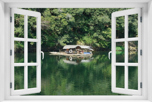 Fototapeta Naklejka Na Ścianę Okno 3D - The beautiful countryside view with the clear river and mountains as background in the countryside of the China