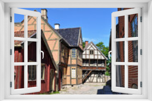 Fototapeta Naklejka Na Ścianę Okno 3D - Oslo, Norway - Old wooden and brick buildings on Bygdoy peninsula. Norwegian open-air museum in Oslo.