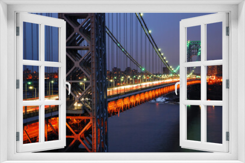 Fototapeta Naklejka Na Ścianę Okno 3D - George Washington Bridge carries night traffic over the Hudson River and Connects Fort Lee New Jersey with New York City