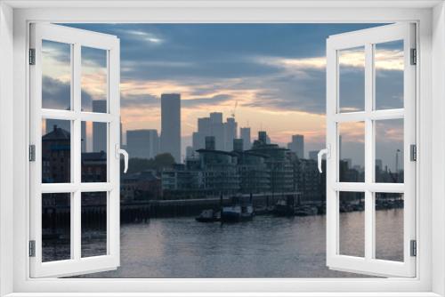 Fototapeta Naklejka Na Ścianę Okno 3D - View of River Thames and City Skyline during dramatic sunrise. City of London, United Kingdom. Travel Destination