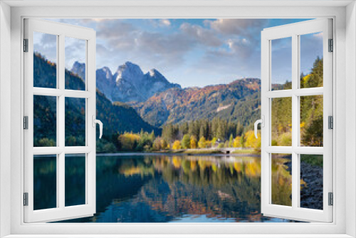 Fototapeta Naklejka Na Ścianę Okno 3D - Peaceful autumn Alps mountain lake with clear transparent water and reflections. Gosauseen or Vorderer Gosausee lake, Upper Austria. Dachstein summit and glacier in far.