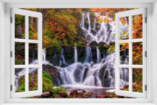 Fototapeta Naklejka Na Ścianę Okno 3D - Beautiful waterfall in autumn forest in Jonkoping, Sweden. Long exposure.