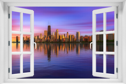 Fototapeta Naklejka Na Ścianę Okno 3D - Colorful sunset above Chicago skyline across Lake Michigan