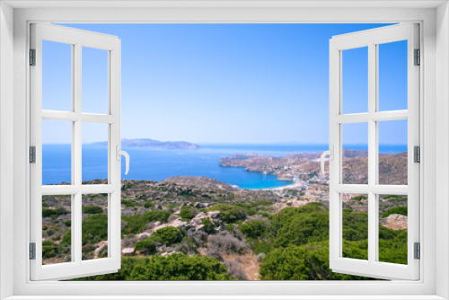 Fototapeta Naklejka Na Ścianę Okno 3D - Breathtaking panoramic view of the famous Mylopotas beach in Ios Greece and the island of Sikinos in the background