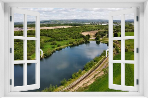 Fototapeta Naklejka Na Ścianę Okno 3D - Aerial view of green fields and open countryside. Taken in Lancashire England. 