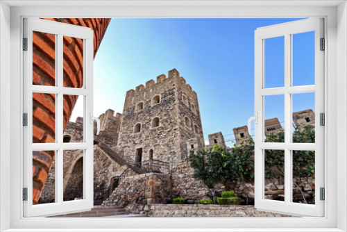Fototapeta Naklejka Na Ścianę Okno 3D - Various views of an ancient fortress, walls, buildings and structures on background of the blue sky. Khertvisi Fortress, Georgia. 