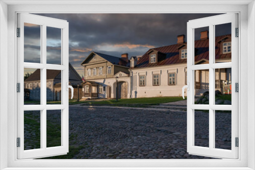 Fototapeta Naklejka Na Ścianę Okno 3D - View of historical merchant buildings of estates on the main street of Izborsk Pechorskaya Street on a summer sunny day, Izborsk, Pskov region, Russia