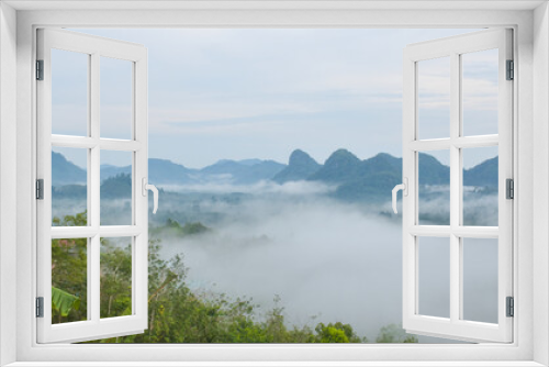 Fototapeta Naklejka Na Ścianę Okno 3D - Morning mist and beautiful mountains in southern Thailand.