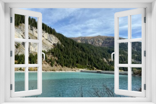 Fototapeta Naklejka Na Ścianę Okno 3D - The reservoir lake Panixersee (Lag da Pigniu) or Panixer Lake on the slopes of the Glarus Alps mountain massif, Pigniu-Panix - Canton of Grisons, Switzerland (Kanton Graubünden, Schweiz)