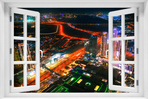 Fototapeta Naklejka Na Ścianę Okno 3D -  Dubai city at night, view with lit up skyscrapers and roads. UAE, 2022