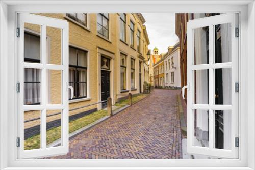 Fototapeta Naklejka Na Ścianę Okno 3D - Old street with historic houses in the center of Leeuwarden, Netherlands