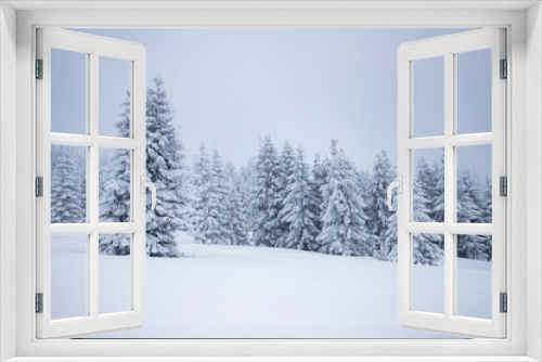Fototapeta Naklejka Na Ścianę Okno 3D - magical frozen winter landscape with snow covered fir trees