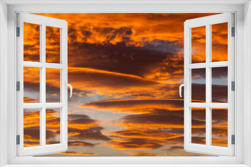 Fototapeta Naklejka Na Ścianę Okno 3D - Sky with spectacular lenticular clouds at dawn