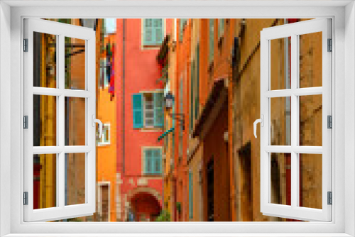 Fototapeta Naklejka Na Ścianę Okno 3D - Traditional old terracotta houses on a narrow street in the Old Town of Villefranche sur Mer on the French Riviera, South of France