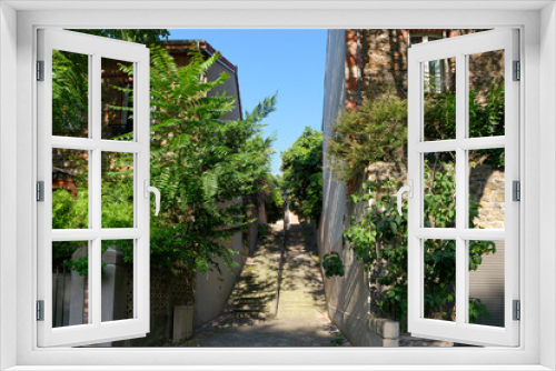 Fototapeta Naklejka Na Ścianę Okno 3D - Staircase to the  countryside neighborhood  in the 20th arrondissement of Paris city