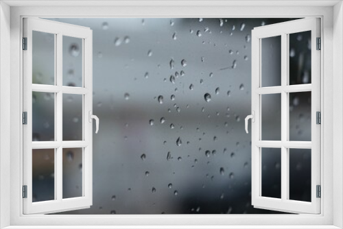 Fototapeta Naklejka Na Ścianę Okno 3D - View of the window covered with raindrops and fog, suitable for backgrounds