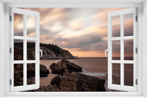Fototapeta Naklejka Na Ścianę Okno 3D - Rocky seascape with lovely sunset 