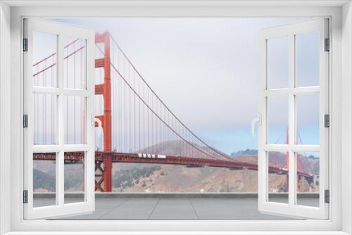 Fototapeta Naklejka Na Ścianę Okno 3D - San Francisco Skyline Golden Gate bridge. Beautiful landmark. Day time. Empty rooftop View. Success concept.