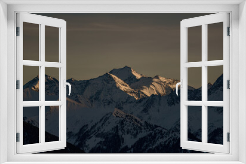 Fototapeta Naklejka Na Ścianę Okno 3D - beautiful morning with view of the snow capped alps in the golden sunlight
