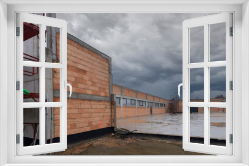 Fototapeta Naklejka Na Ścianę Okno 3D - Ein neues Gebäude wird gebaut 