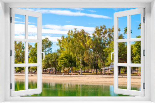 Fototapeta Naklejka Na Ścianę Okno 3D - Tranquil lakefront walking trail landscape at Lake Havasu and turquoise-colored water in Havasu City, Arizona