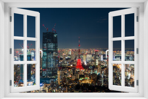 Fototapeta Naklejka Na Ścianę Okno 3D - Tokyo, Japan - November 2022: Panoramic view of Tokyo skyscrapers and Tokyo tower with special illumination for full moon night.