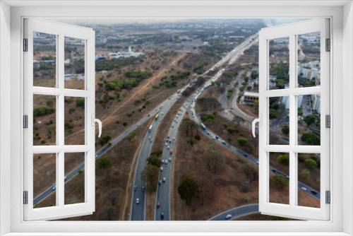 Fototapeta Naklejka Na Ścianę Okno 3D - large highway seen from above with roundabouts in Brasilia