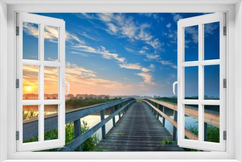 Fototapeta Naklejka Na Ścianę Okno 3D - charming wooden bridge over river