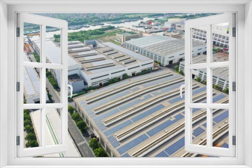 Fototapeta Naklejka Na Ścianę Okno 3D - solar panels on factory rooftop