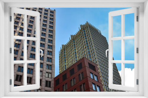 Exterior of beautiful buildings against blue sky, low angle view