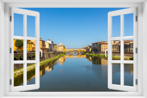 historic Ponte Veccio in Florence at river Arno