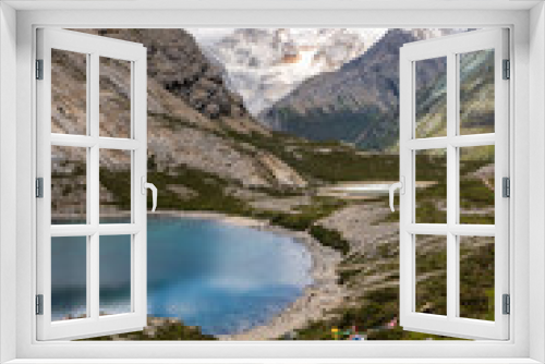 Fototapeta Naklejka Na Ścianę Okno 3D - Vertical image of Snow mountain and Five color Lake (Wuse Hai) in Yading national reserve, Daocheng county, Sichuan province, China. Blue sky with copy space for text