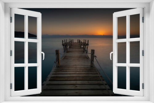 Fototapeta Naklejka Na Ścianę Okno 3D - Wooden pier and sunrise over the beautiful Akaba Bay Egypt