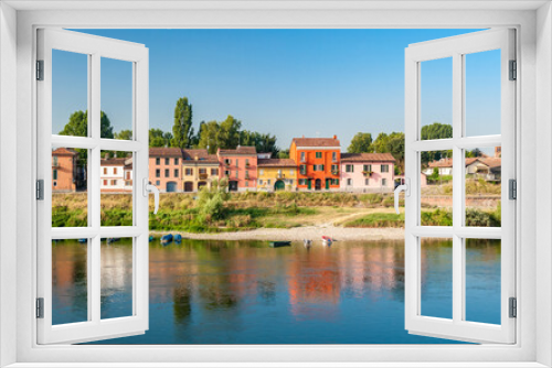 Colored houses along the south bank of river Ticino in Pavia in northern Italy