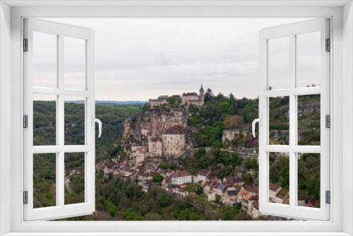 Fototapeta Naklejka Na Ścianę Okno 3D - Aerial view of Beautiful village Rocamadour in Lot department, southwest France. Its Sanctuary of the Blessed Virgin Mary, has for centuries attracted pilgrims.