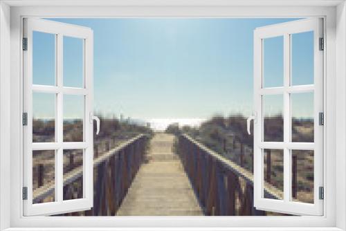 Fototapeta Naklejka Na Ścianę Okno 3D - wooden bridge to the sea