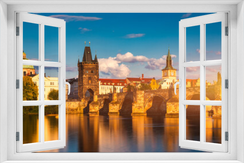 Fototapeta Naklejka Na Ścianę Okno 3D - Charles Bridge in Prague in Czechia. Prague, Czech Republic. Charles Bridge (Karluv Most) and Old Town Tower. Vltava River and Charles Bridge. Concept of world travel, sightseeing and tourism.