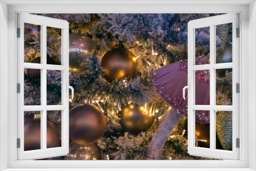 Fototapeta Naklejka Na Ścianę Okno 3D - Magic pink mushroom and a lot of Christmas balls on the Christmas tree. New Year mood. Close-up. Festive Christmas toys.