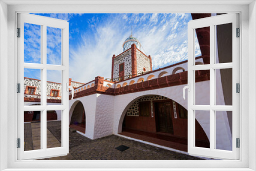 Fototapeta Naklejka Na Ścianę Okno 3D - Courtyard of the lighthouse of Punta La Entallada overlooking the Atlantic Ocean on Fuerteventura in the Canary Islands, Spain