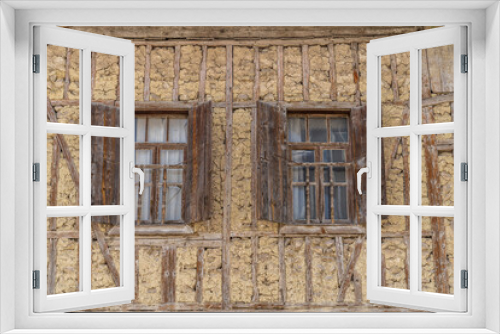 Fototapeta Naklejka Na Ścianę Okno 3D - Traditional Ottoman house in Safranbolu. Safranbolu UNESCO World Heritage Site. Old wooden mansion turkish architecture. Wooden ottoman mansion windows.